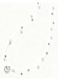 Murmur necklace with pearls and moonstone on fishing line - modern and versatile jewelry for women