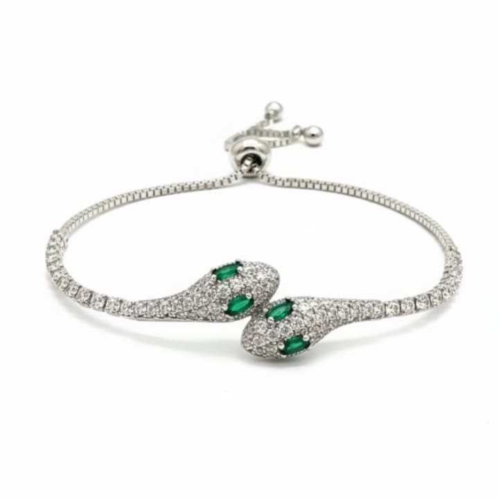 Murmur 999 silver bracelet in the shape of a snake with green eyes, unique and delicate design - fine jewelry for women, refined gift and versatile accessory