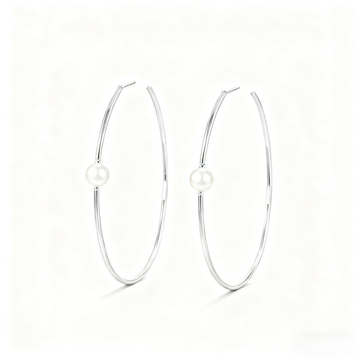 Murmur round silver earrings with pearls, simple and unique design - elegant jewelry for women, modern accessory