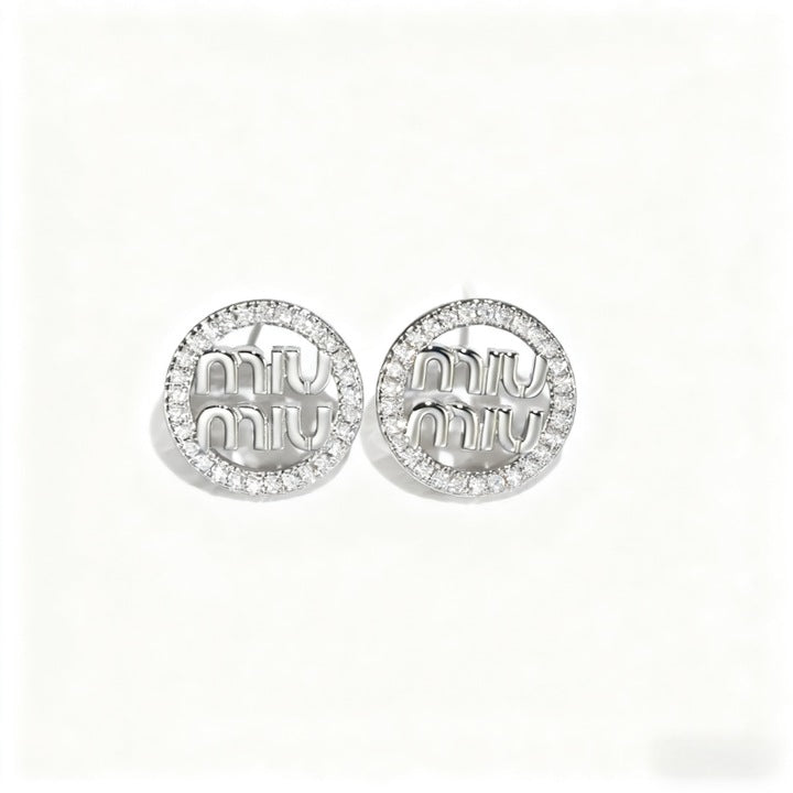 Murmur round earrings made of 925 silver with moonstone, miumiu details, elegant and modern design - refined jewelry for women, gold fashion accessory